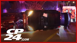 Driver crashed into parked cars before rolling over in Toronto’s west end, police say
