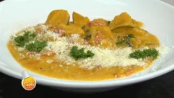 Creamy squash stew with dry cheese and fresh parsley