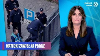 Matecki got stuck on the Academy fence. Police surrounded the building