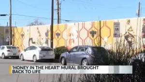 University Heights community brings mural back to life