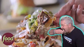 Guy Fieri Finds Epic Mountain Nachos And Super Biscuit Spread Waffles | Diners, Drive-Ins, and Dives