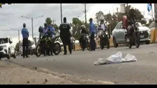 Elderly woman killed after being struck by motorcycle