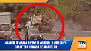 Cargo truck loses control and overturns on private road in Amatitlán