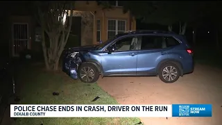 Driver chased by police in DeKalb County crashes SUV into parked car