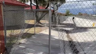 Damaged fences near drainage tunnels raise safety concerns