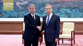 Chinese Foreign Minister Wang Yi meets with former Japanese Foreign Minister Takeshi Iwaya