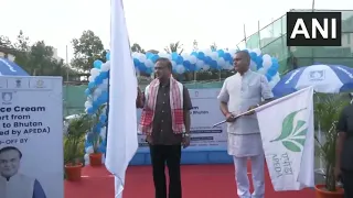 #WATCH | Guwahati, Assam: CM Sarma flags off the first consignment of Purabi products to Bhutan.