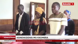 Обвинение в подделке подписи президента Мусевени.