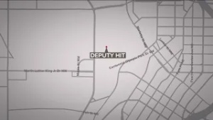 Former deputy working as detail hit by vehicle at Publix Atlanta Marathon