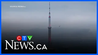 Red Bull athlete performs meticulous stunt to celebrate the CN Tower's 50th anniversary