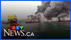 Fire crews battle blaze on passenger ferry as it approaches Indonesian port