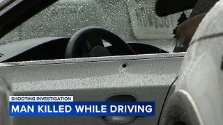 Man, 70, dies after being found shot inside crashed BMW