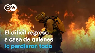 Thousands of evacuees return home after fires in Spain and France