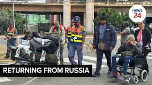WATCH | 11 SA men lured to Russia arrive at King Shaka Airport