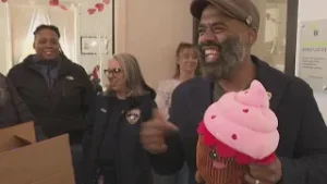 York City officials and law enforcement help hand out over 100 teddy bears