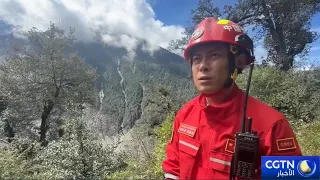 Natural flow of barrier lake reduces danger as rescue teams continue to monitor water levels