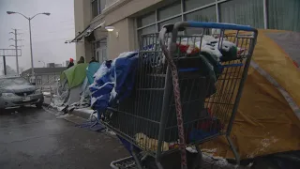Homeless advocates set up tents outside building previously used as cold weather shelter