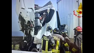 Serious highway accident, truck driver pulled alive from the wreckage by firefighters