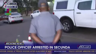 Police officer arrested for truck hijacking