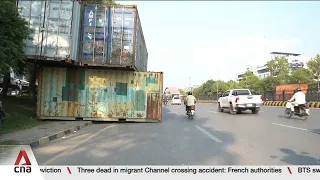 Shipping containers block Islamabad's roads as Imran Khan's party postpones protest march