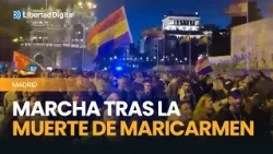 Protesters march from Sol to the house where Maricarmen used to live