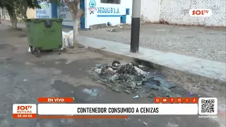 Trujillo: Trash container reduced to ashes.