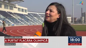 A PURTAT FLACĂRA OLIMPICĂ