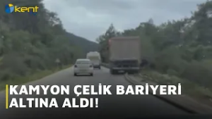 KAMYON ÇELİK BARİYERİ ALTINA ALDI!