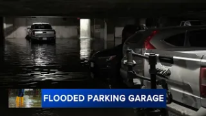 Water floods parking garage in Spring Garden, submerging nearly 20 vehicles