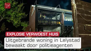 Uitgebrande woning in Lelystad bewaakt door politieagenten