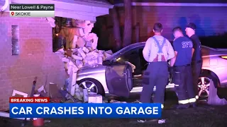 Car crashes into home's garage in Skokie, video shows