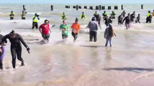 Thousands brave icy waters of Lake Michigan for 26th annual Polar Plunge benefiting Special Olympics