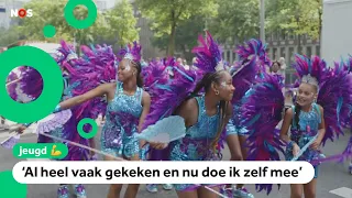 Children dance and party in the Summer Carnival parade through Rotterdam