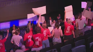 Public meeting cut short after residents call for vote on stadium