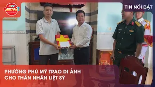 PHU MY WARD PRESENTS RESTORED PORTRAITS TO THE FAMILIES OF MARTYRS
