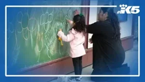 Advocates rally against proposed child care budget cuts in WA