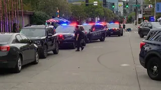 One suspect in custody, police search for another after deadly Seattle shooting