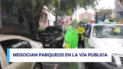 “Parking lots” charge for reserving spaces on public roads