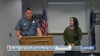 Woman named honorary trooper for saving life on I-135
