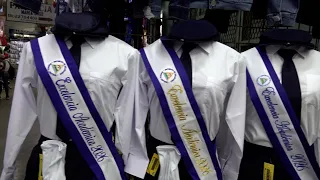 Roberto Huembes Market dresses in blue and white with patriotic deals