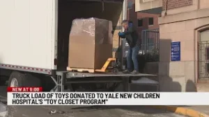 Truck load of toys collected by Connecticut Lottery donated to Yale Toy Closet program
