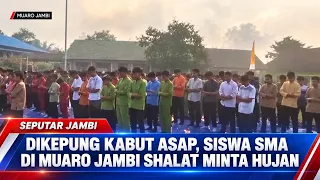 SURROUNDED BY SMOG, HIGH SCHOOL STUDENTS IN MUARO JAMBI HOLD PRAYER FOR RAIN