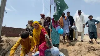 Pakistan residents flee after heavy monsoon rains inundate villages