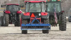 Heber City farmers hold 'tractorade' to show they're against UDOT's highway proposal