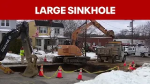 Dozens lose water, gas after sinkhole and main break
