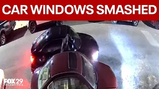 Car windows smashed by person hanging out of vehicle in Philadelphia