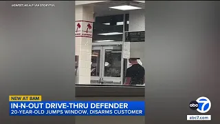 Man jumps through In-N-Out drive-thru window to stop armed woman
