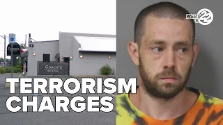 Man faces terrorism, other charges after bringing weapons to Stevensville bar, police say