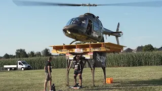 World Record: Extreme athlete carries helicopter