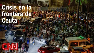Migrant surge crosses into Ceuta, overwhelming Spanish police